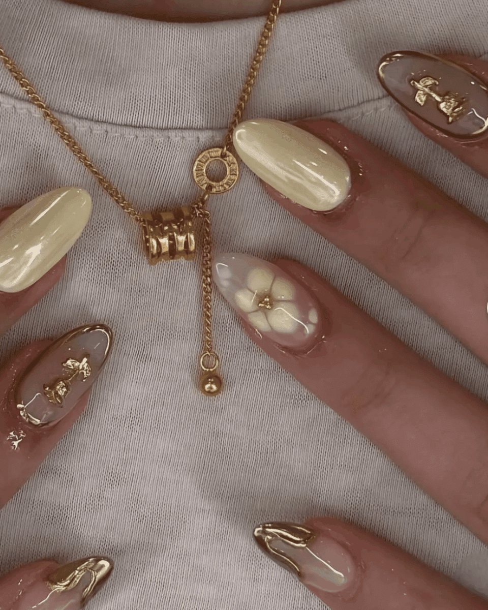 butter yellow nails with pressed flower nail art spring 2026