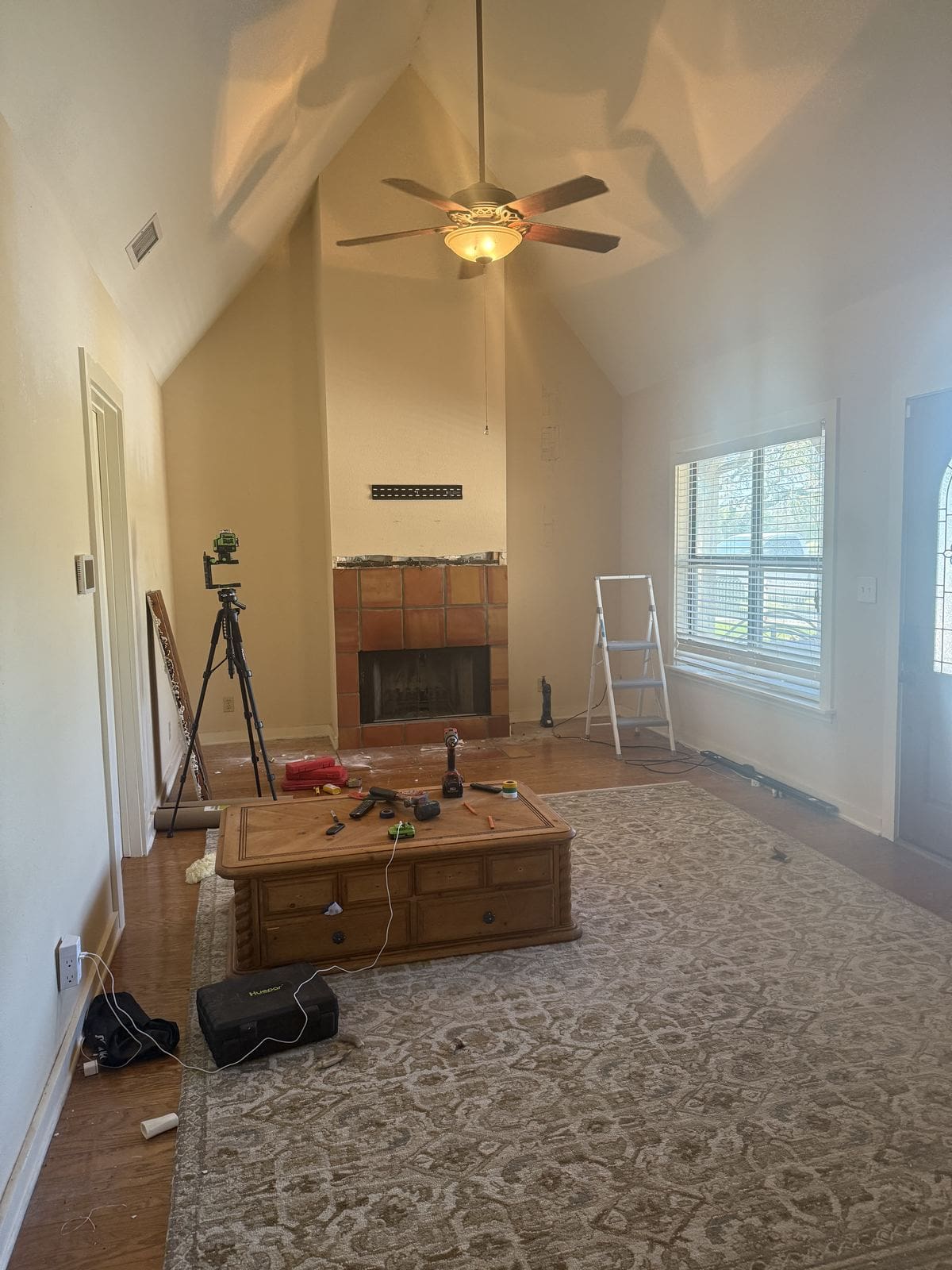 Empty living room cleared out and prepped before the wood plank ceiling install.