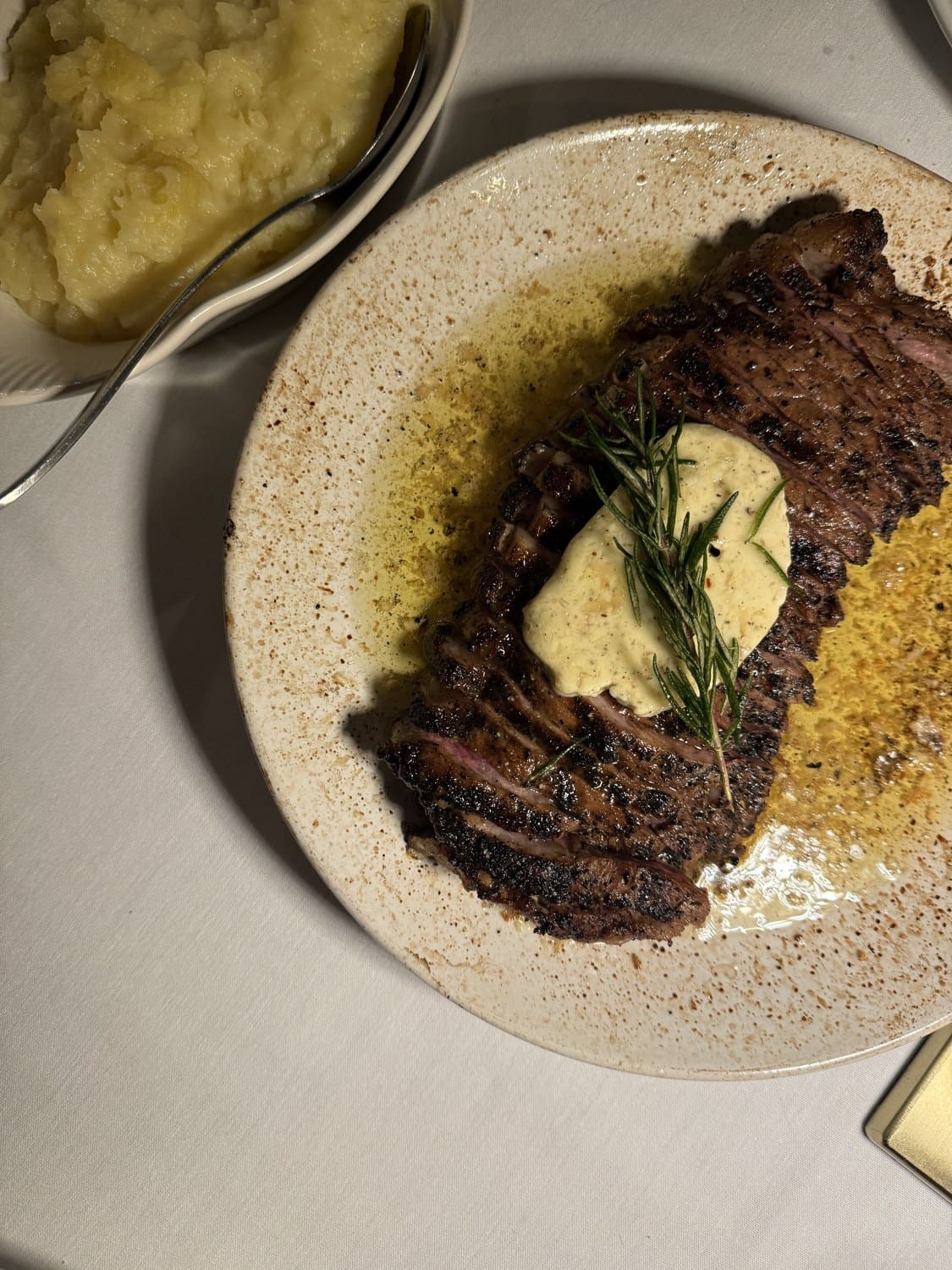 A steak with herb butter at Jack
