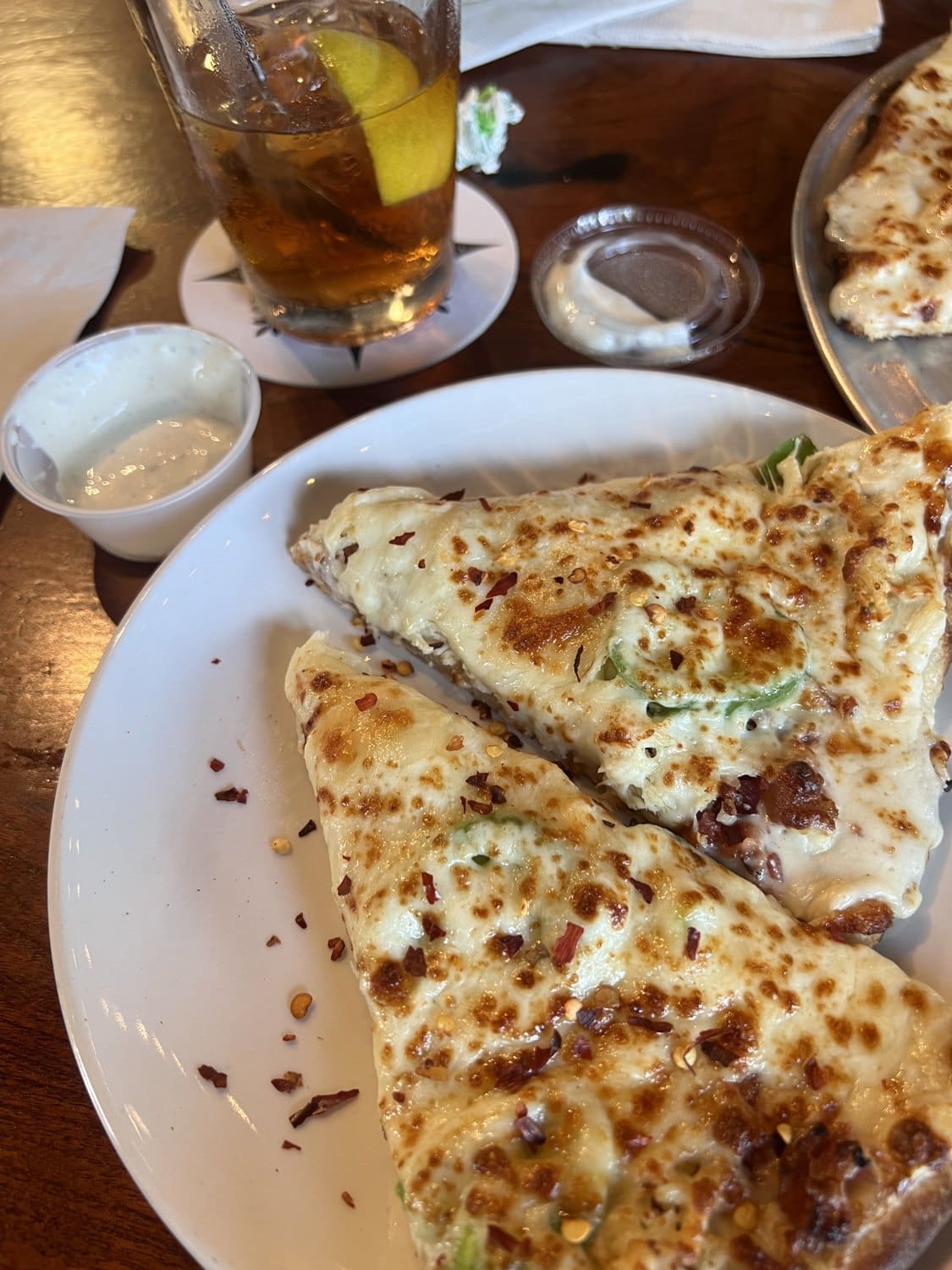 A white pizza at Pint and Plow Brewing in Kerrville