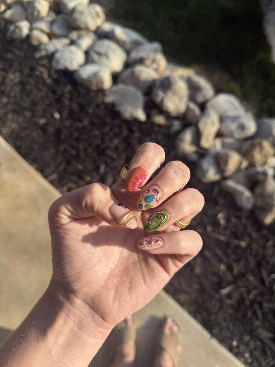 Maximalist mismatched nail art