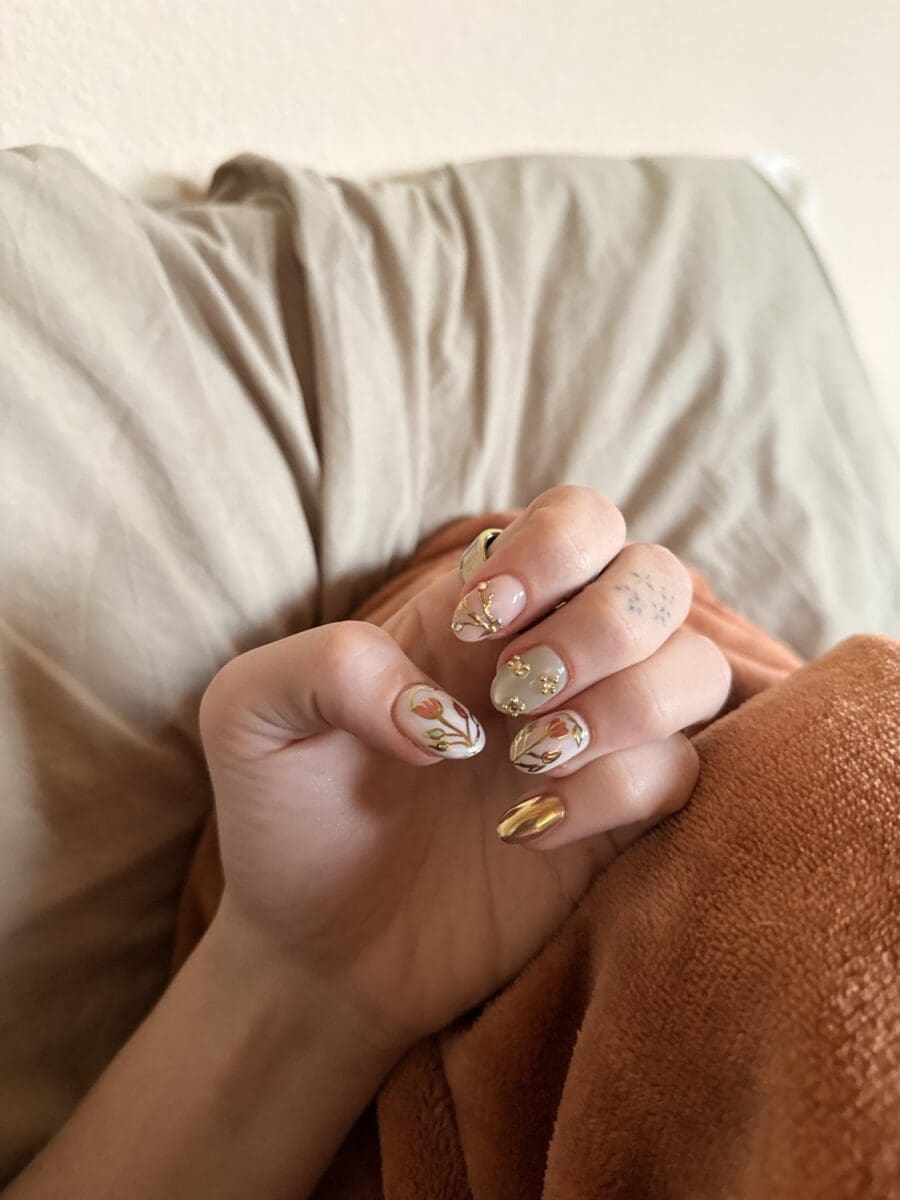 Maximalist mismatched nail art