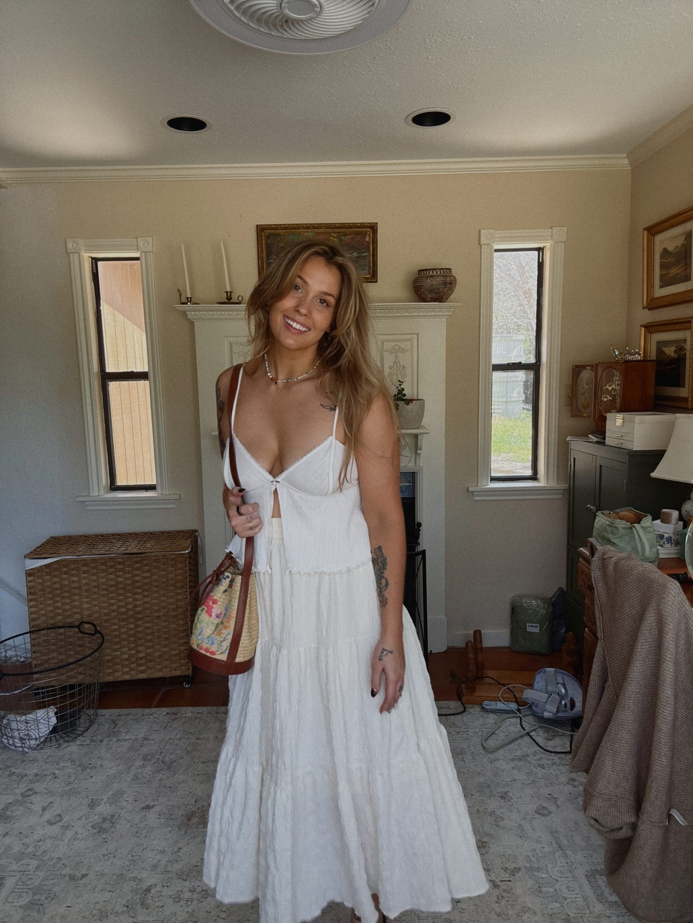 White tie-front cami styled with a long white maxi skirt
